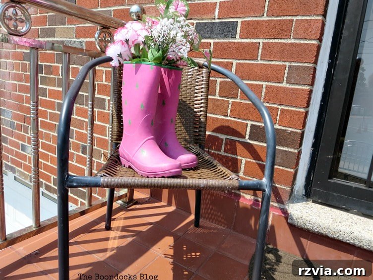 Rattan Revival: Creative Ideas for Your Damaged Chair 4 The initial, unsuccessful attempt to repurpose the rattan chair, featuring rubber boots and faux flowers.