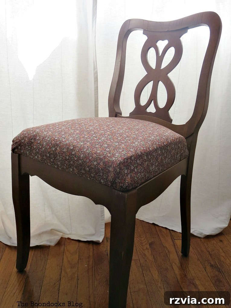 Before shot of two identical chairs needing a makeover, highlighting their untapped potential for unique transformations.