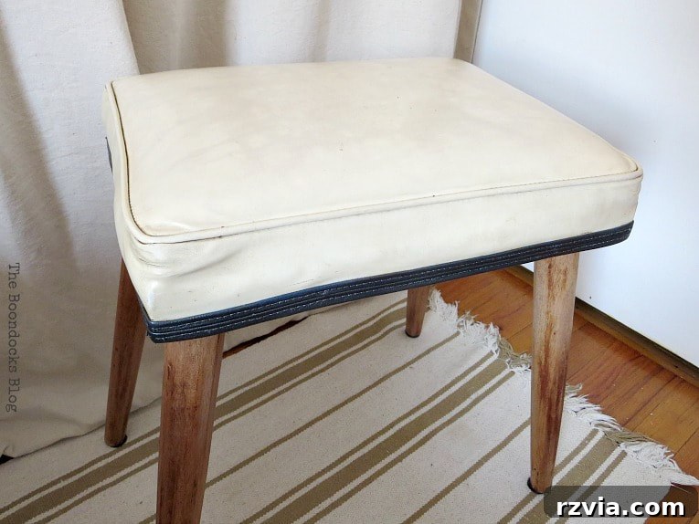 Another view of the finished Mid-Century Modern small bench, highlighting its refreshed aesthetic and clean lines.