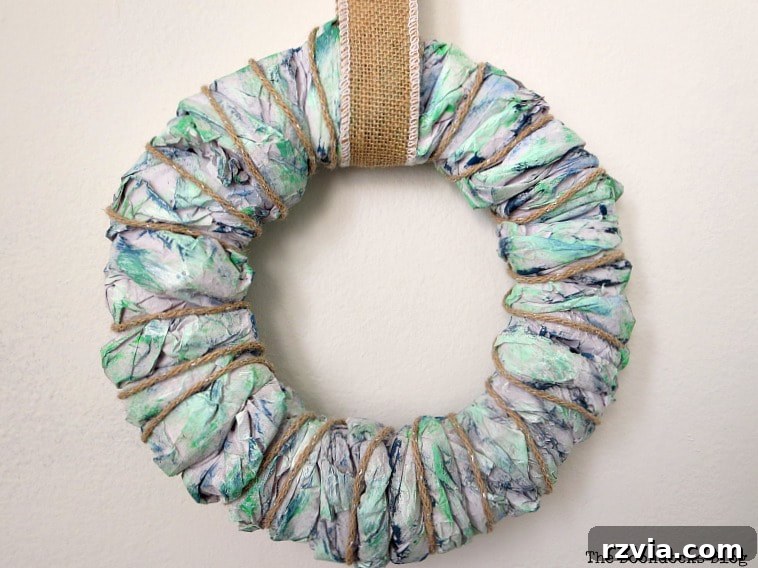 Bright Ideas Easy Colorful Packing Paper Wreath 14 An easy DIY wreath made with colorful packing paper, showcasing its full and textured appearance, ready to adorn any home space.