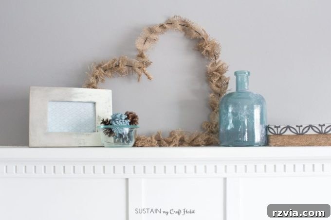 Bright Ideas Easy Colorful Packing Paper Wreath 19 A simple yet charming DIY wreath crafted from a wire coat hanger and adorned with burlap, forming a rustic heart shape ideal for farmhouse-style decor.