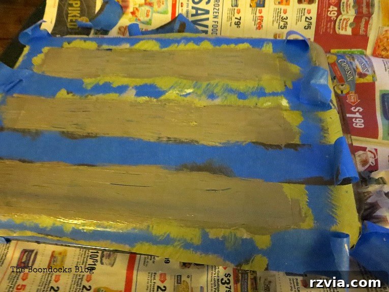 Crafting Your Charmingly Casual Coffee Nook 9 Adding more beige paint to the glass baking dish, further enhancing its distressed, aged appearance.