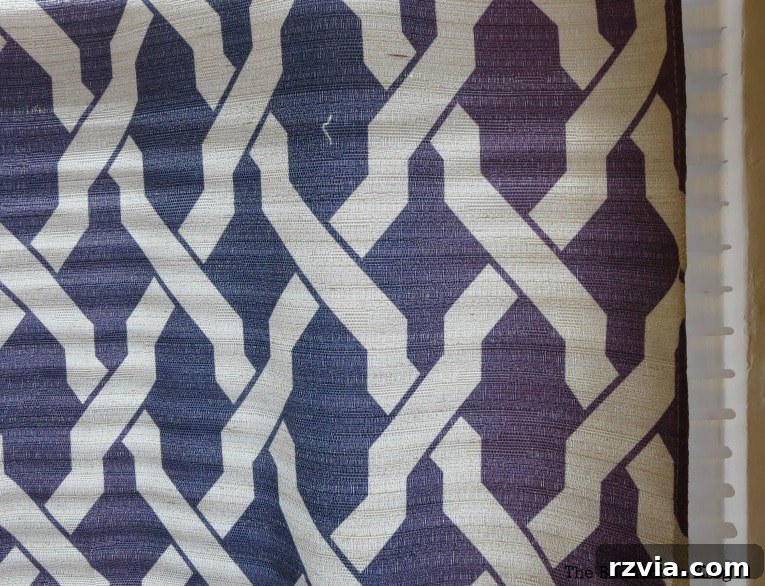 Crafting Elegant Pleated Curtains from Humble Drop Cloths 3 Close-up of old, faded, and worn sheer curtains in a room.