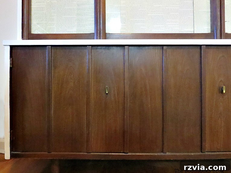 Revitalize Your MCM China Cabinet 19 Detailed view of the bottom half of the beautifully restored mid-century modern china cabinet, highlighting its renewed elegance.
