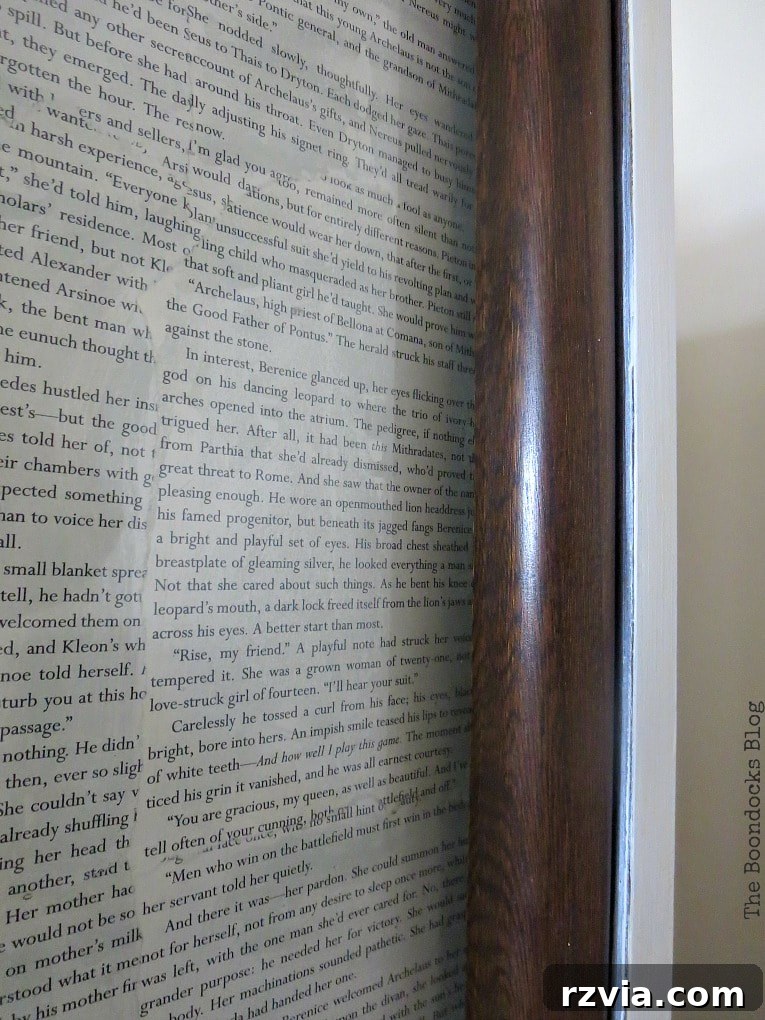 Revitalize Your MCM China Cabinet 22 Detailed shot of the preserved walnut wood section of the china cabinet, highlighting the rich grain and craftsmanship.