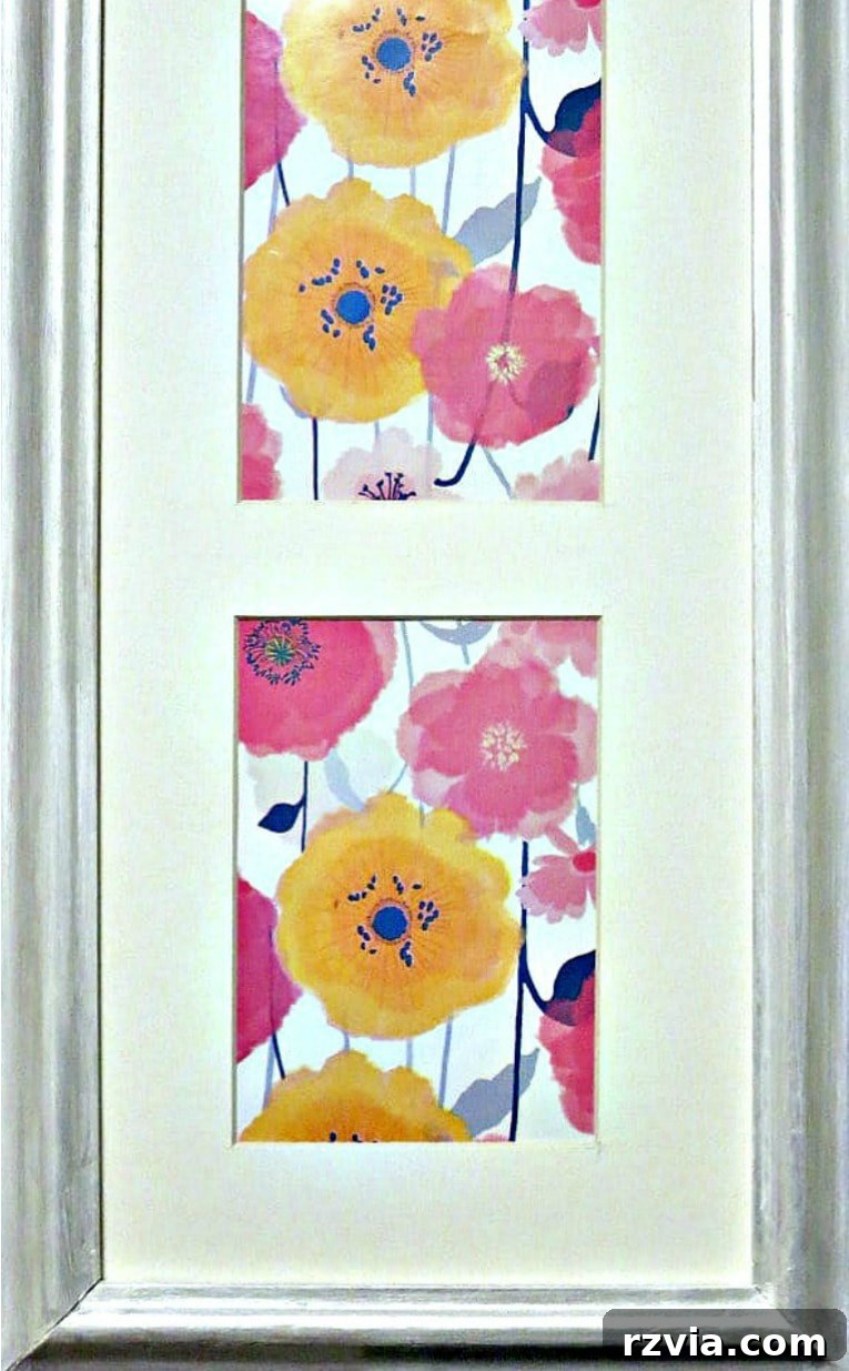 Your Home's Instant Spring Art Makeover 12 Close up of the finished floral wrapping paper artwork, beautifully displayed within the frame.