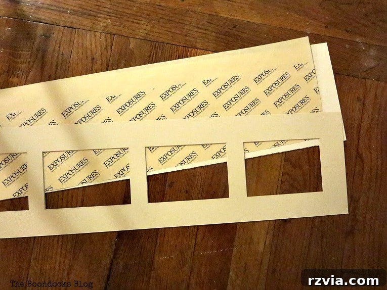 Your Home's Instant Spring Art Makeover 5 Mat with five openings of the disassembled picture frame, ready for customization.