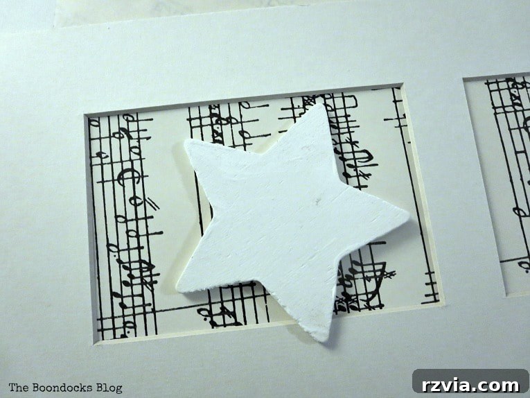 Your Home's Instant Spring Art Makeover 6 Picture frame mat featuring music paper and a star, an initial design concept.