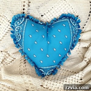 No-sew Valentine's Day craft: a sweet bandana heart pillow, a cozy and charming handmade gift or decor item.