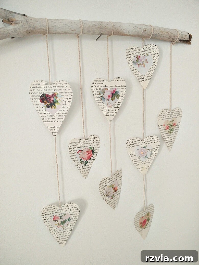 Whimsical simple Valentine's Day wall decor featuring a rustic branch with heart embellishments, perfect for festive home decor.