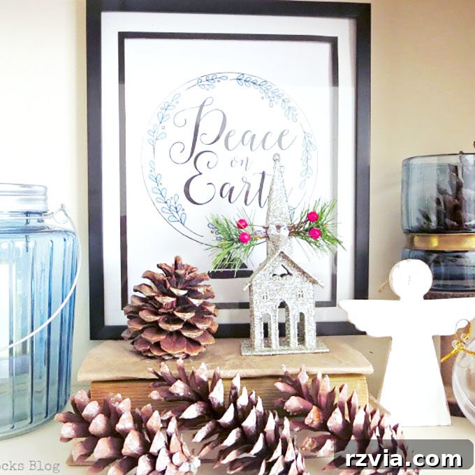 Rustic Christmas vignette featuring a wooden sign, pinecones, and cozy textures.