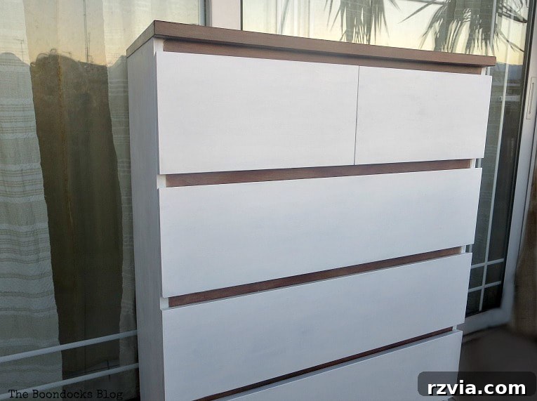 Stunning Black Ikea Malm Dresser Makeovers 17 The finished dresser, beautifully painted in a two-tone white and walnut scheme, achieving a farmhouse style.