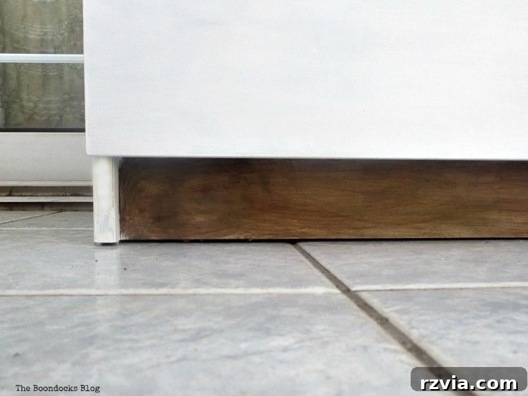 Stunning Black Ikea Malm Dresser Makeovers 19 Close-up view of the bottom section of the transformed dresser, highlighting the painted details.