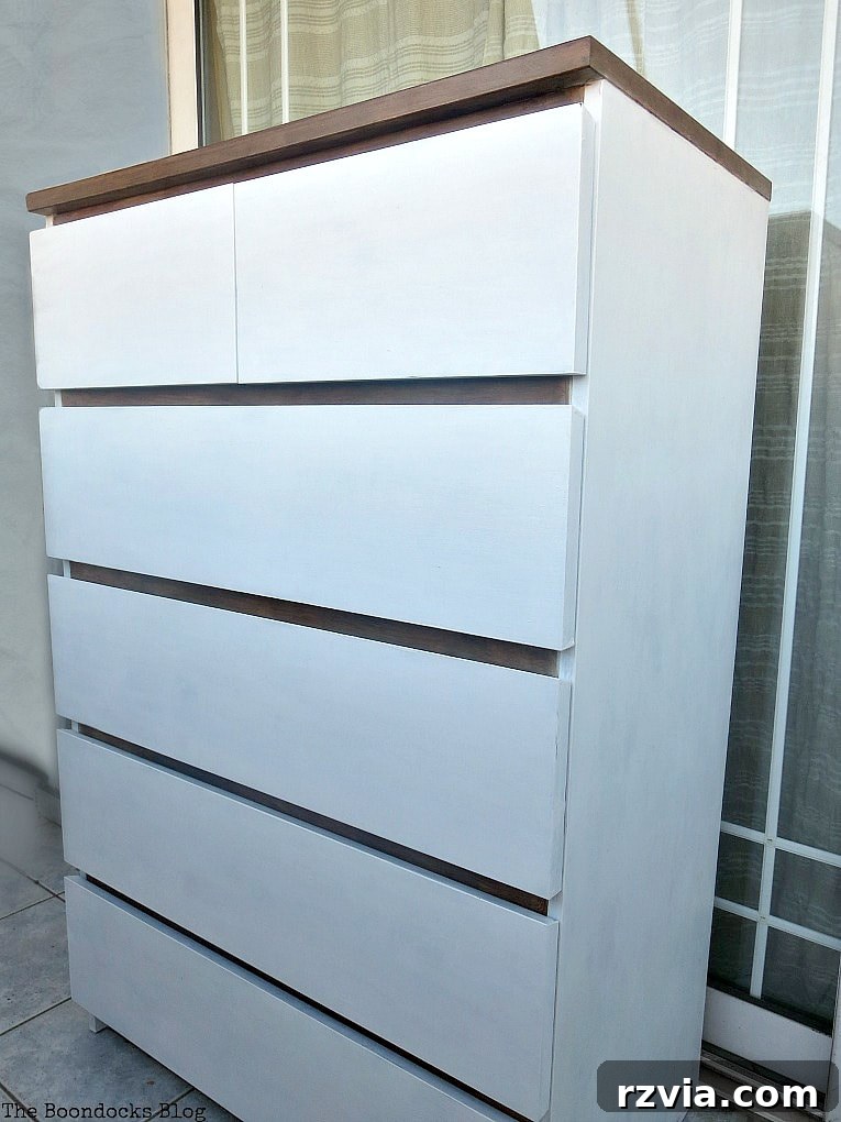 Stunning Black Ikea Malm Dresser Makeovers 22 The fully transformed dresser, showcasing its new white and walnut colors and farmhouse aesthetic.