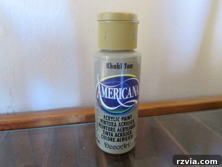 Stunning Black Ikea Malm Dresser Makeovers 7 A bottle of Khaki Tan Americana Acrylic paint, representing the type of paints used for custom color mixing.