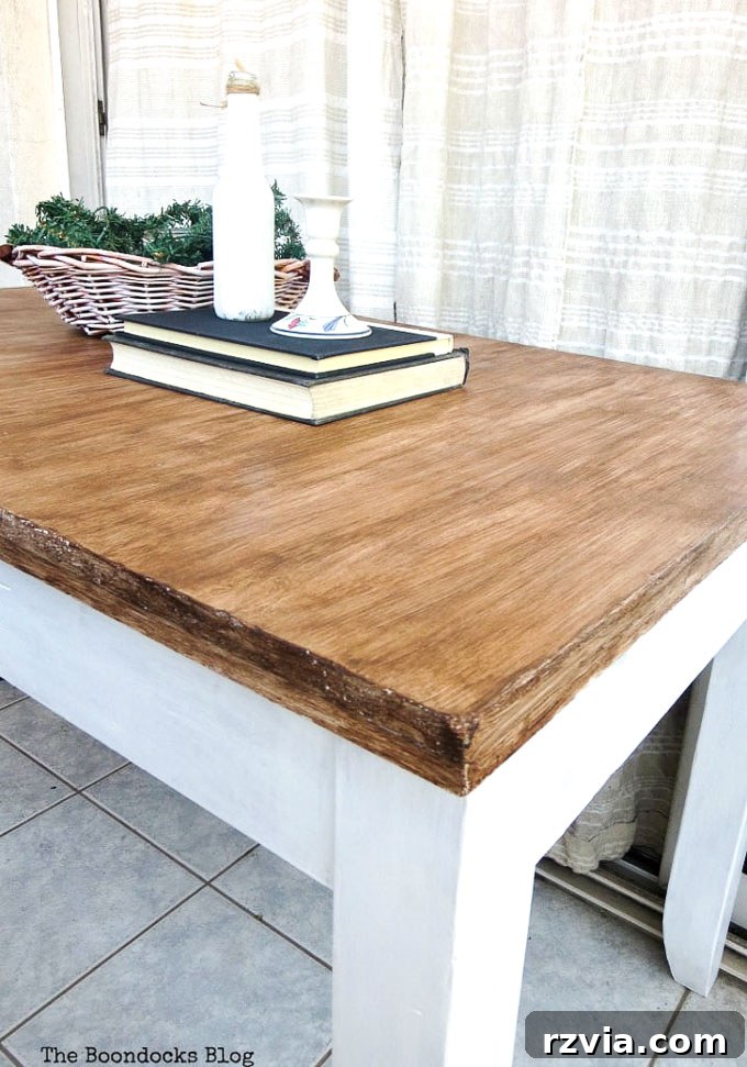 Transformed laminate table with a fresh paint and gel stain finish.