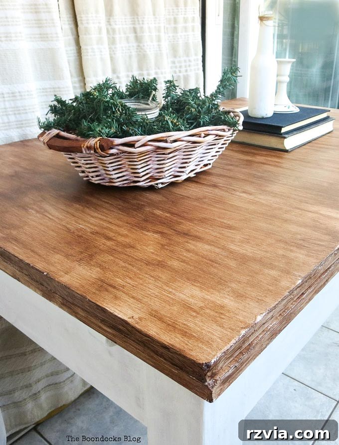 Finished upcycled laminate table showcasing the walnut and white color contrast.