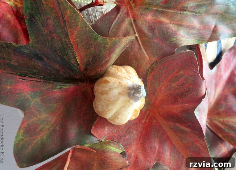 Dollar Store Vine Transformed into a Gorgeous Fall Wreath 15 Mini squash painted in bronze, tan, and black, ready to be added to the DIY fall wreath.