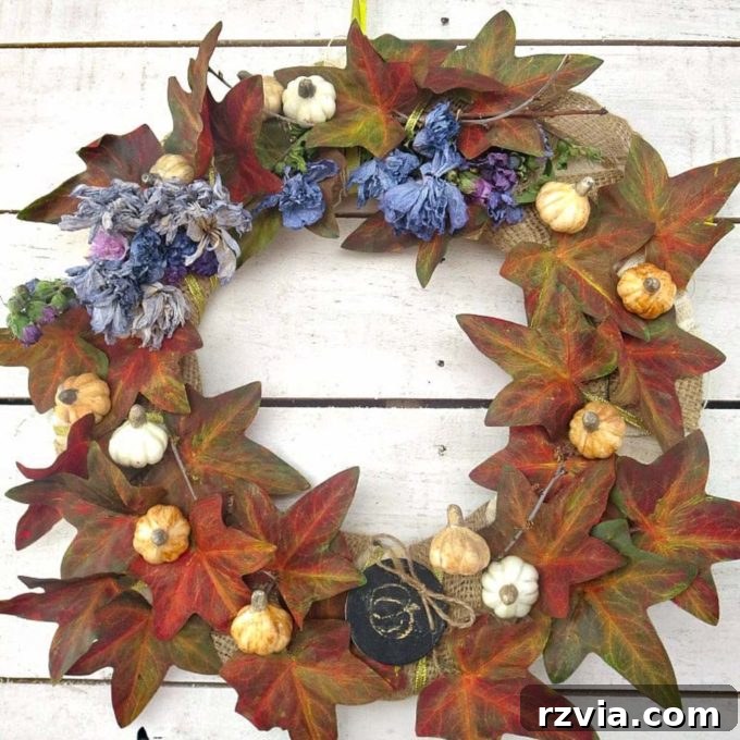 Dollar Store Vine Transformed into a Gorgeous Fall Wreath 19 Beautiful fall wreath made with an upcycled dollar store vine and painted embellishments.
