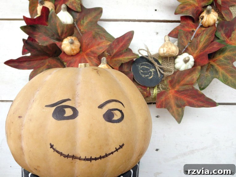 Dollar Store Vine Transformed into a Gorgeous Fall Wreath 21 The pumpkin man gives his approval to the newly crafted DIY fall wreath.
