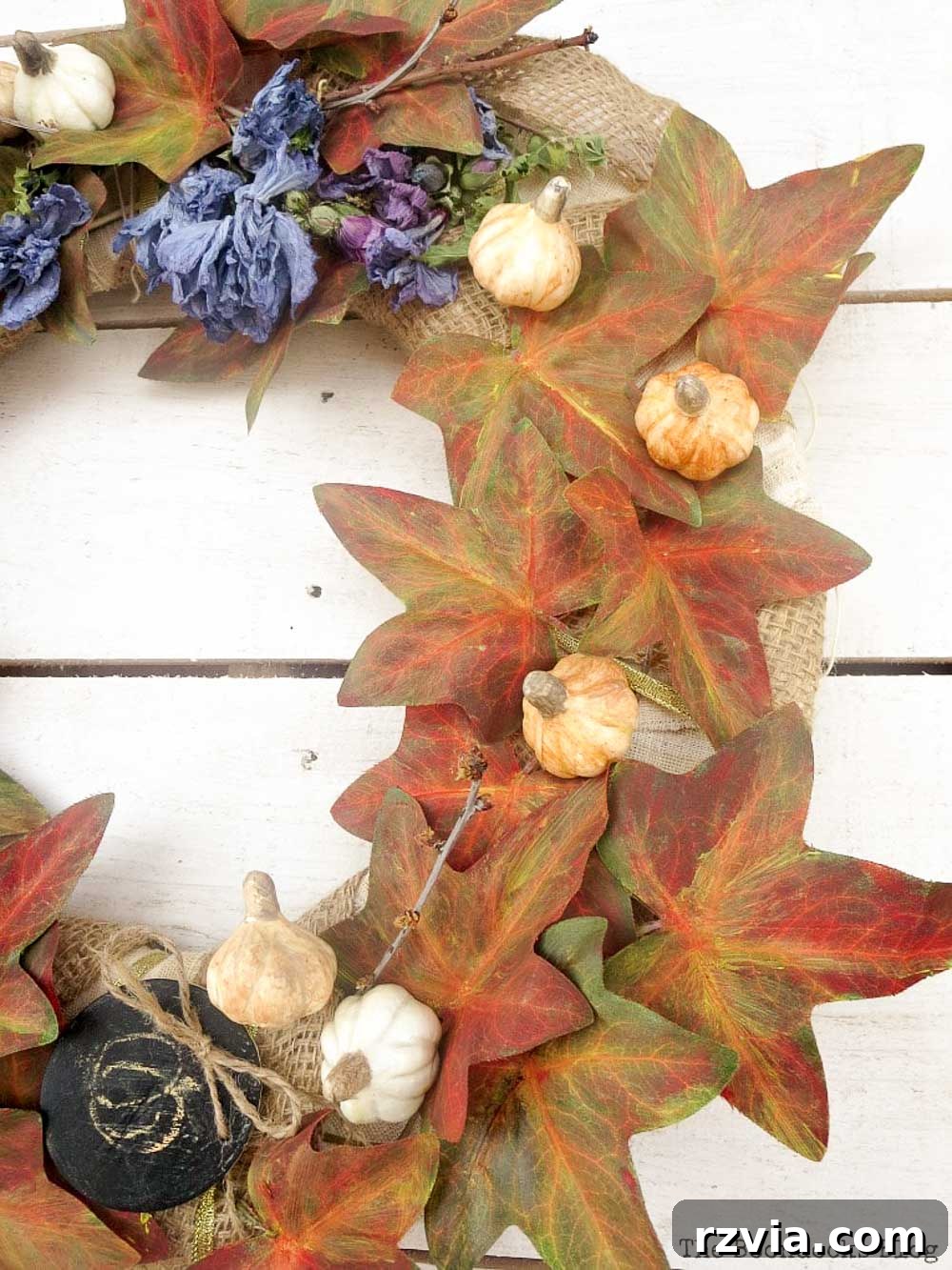 Dollar Store Vine Transformed into a Gorgeous Fall Wreath 23 A close-up shot of the finished DIY fall wreath, highlighting its texture and fall colors.