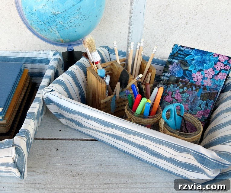 Fabric Fix: Giving New Life to Old Plastic Baskets 13 A detailed shot showing colorful pencils, pens, and markers neatly stored inside one of the fabric-wrapped baskets.