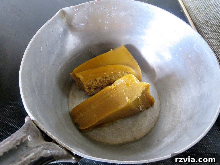 Craft Your Own Natural Beeswax Furniture Polish 6 Beeswax in a pot ready to be melted.