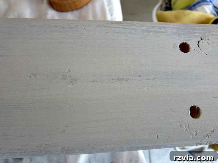 Elevate Your IKEA Hejne Shelf With A Fresh Coat Of Paint 12 Distressing the painted Ikea Hejne shelf.