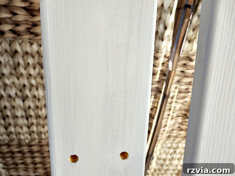 Elevate Your IKEA Hejne Shelf With A Fresh Coat Of Paint 10 Painted wood with streaks of white paint.