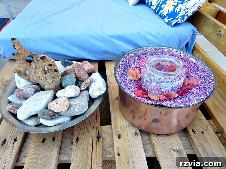 Copper Pot Upcycling Nightmares 21 Abstract art and beaded lantern displayed on a pallet couch, showcasing the final arrangement