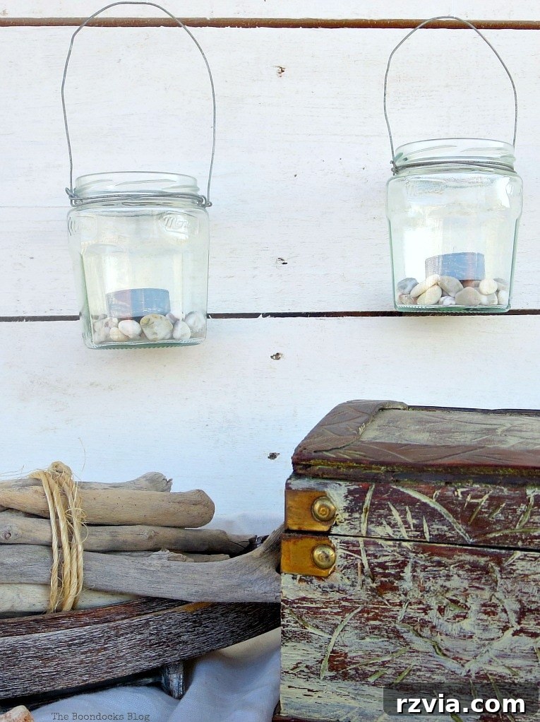 Transform Jars into Glowing Lanterns 15 Hanging tea light lantern jars, showcasing an easy craft idea for repurposed jars to create charming tealight lanterns and fast DIY lantern lights using a simple wire project.