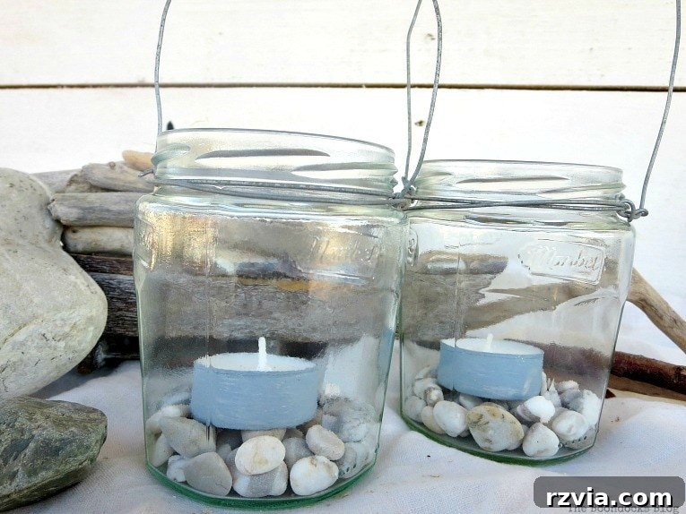 Transform Jars into Glowing Lanterns 16 Two charming tea light lantern jars, an easy craft made from repurposed jars, perfect as tealight lanterns or fast DIY lantern lights through a simple wire project.