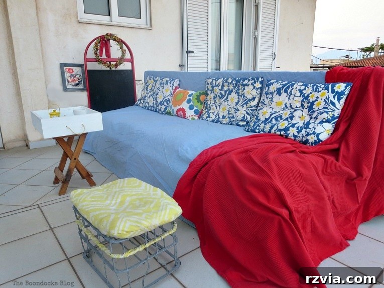 Super Simple Pallet Couch No Tools Needed 16 A closer look at the super quick pallet couch, emphasizing its rustic appeal and comfort.