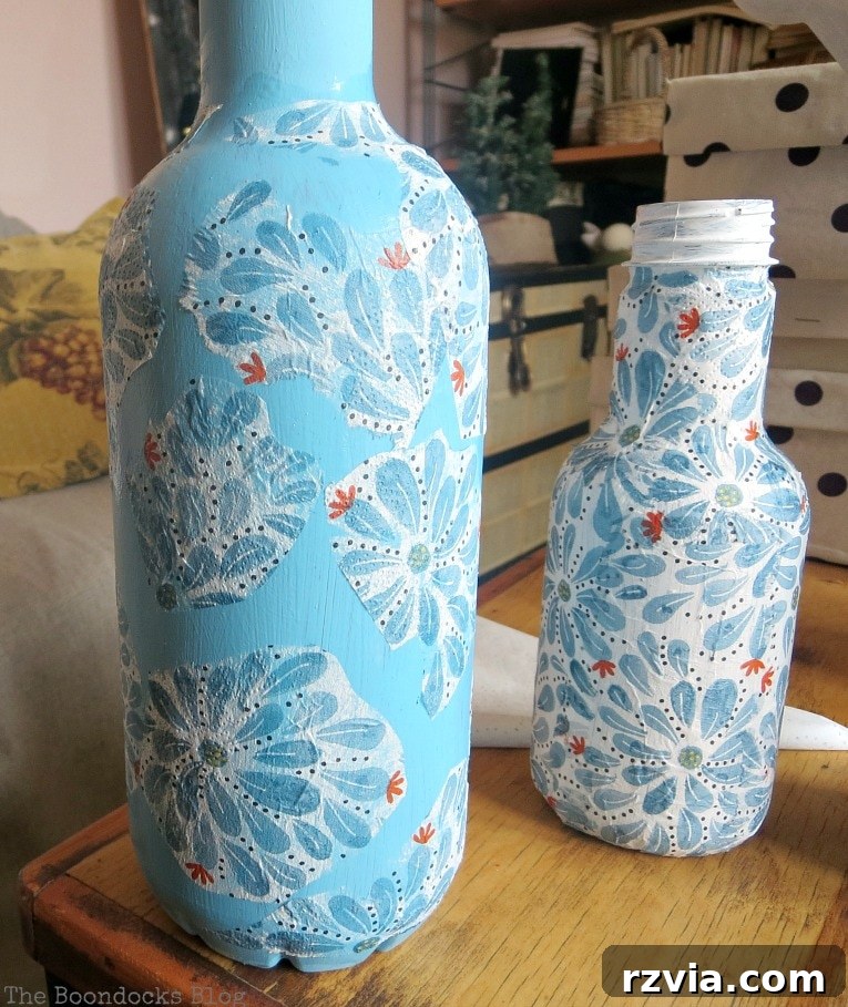 Adding flower shapes from the napkins to plastic bottles, an alternative decorative approach.