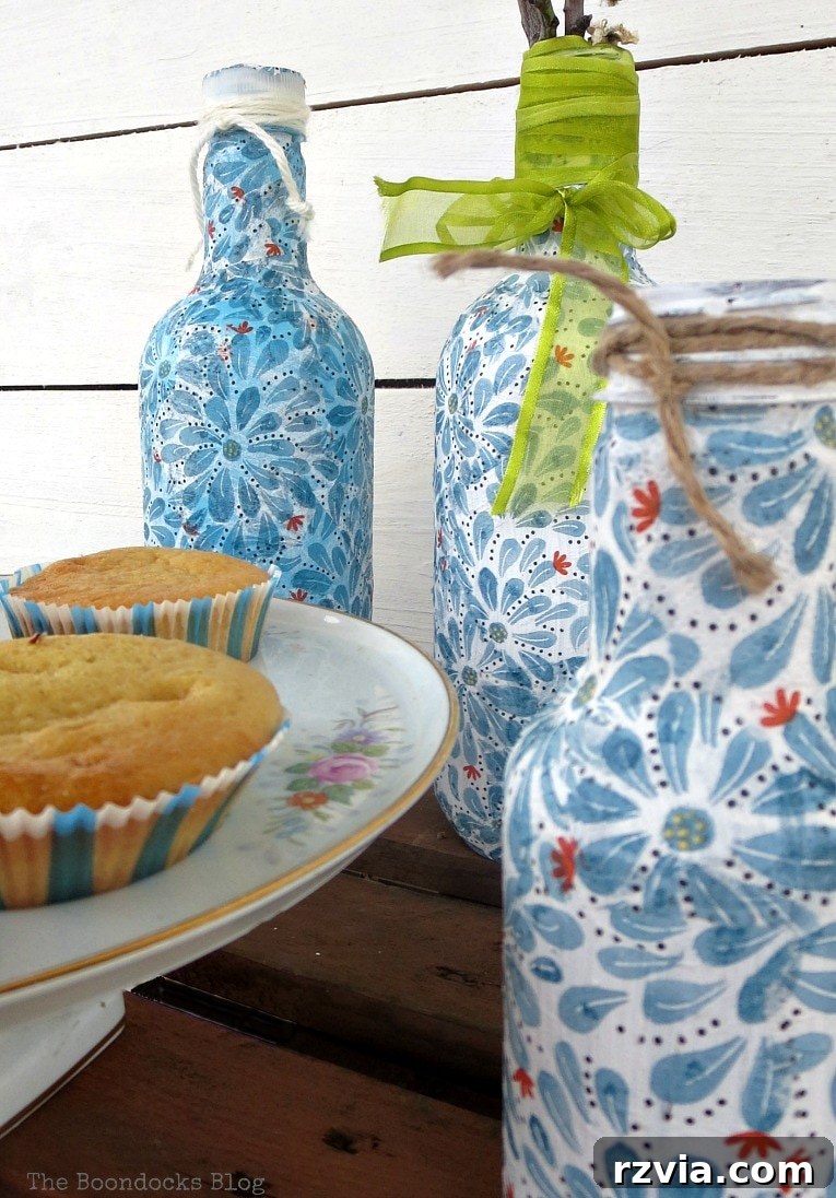 Decoupaged bottles with Ikea napkin, a close-up of the final result.