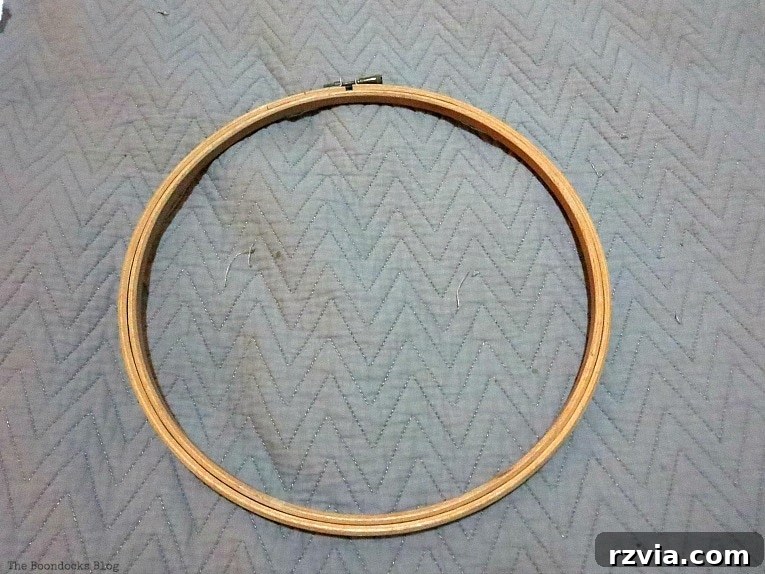 Upcycled T-shirt Wall Decor 6 Wooden embroidery hoop, ready for framing the t-shirt art.