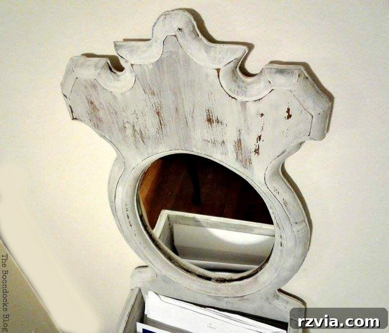 Top-down view of the newly painted mirror, highlighting its unique storage box feature. theboondocksblog.com