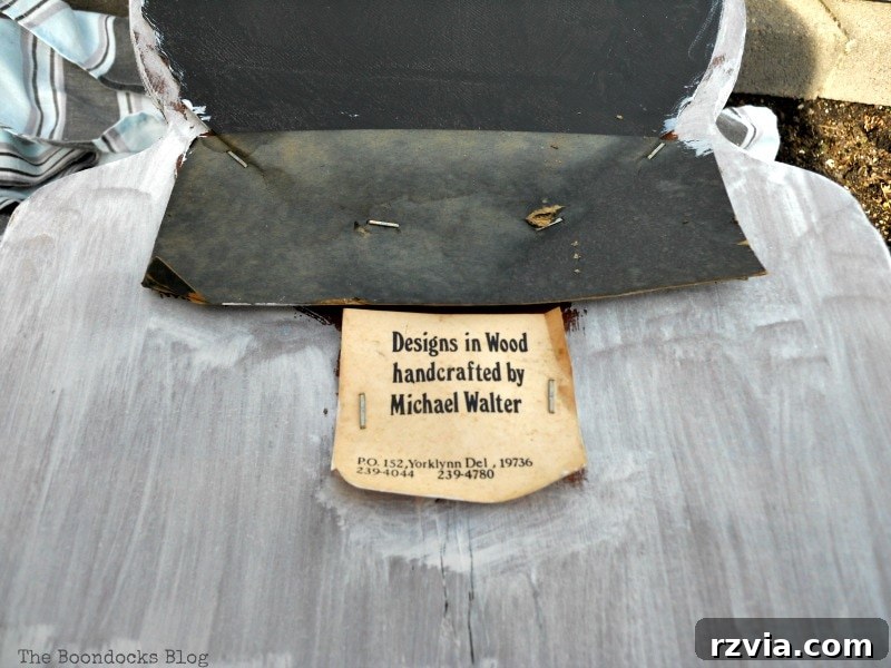 Close-up of an old, mysterious label found on the back of the mirror frame. theboondocksblog.com