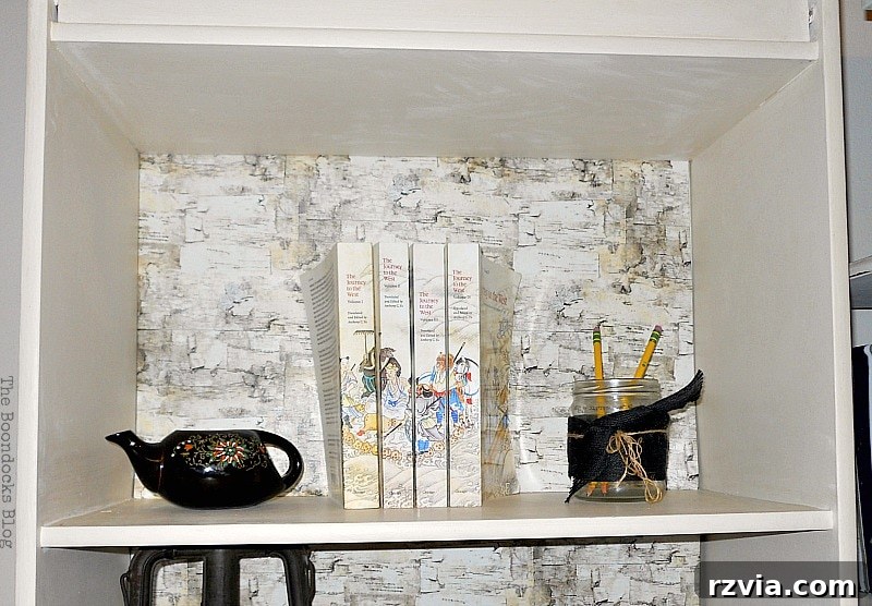Paper and Paint Power: Bookcase Transformations 15 Close up of a milk pourer,, books and a glass jar.