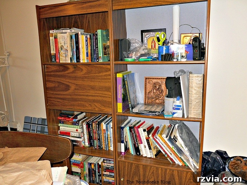 Paper and Paint Power: Bookcase Transformations 22 Brown book shelves decorated with books.