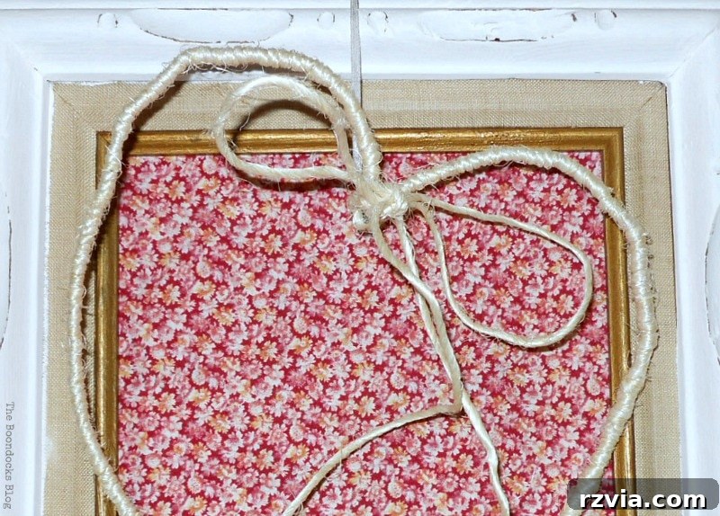 DIY Valentine Heart Frame 13 Close-up of the finished twine heart, hanging delicately within the frame