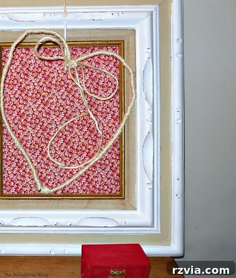 DIY Valentine Heart Frame 15 The charming twine-wrapped wire heart, ready to be hung