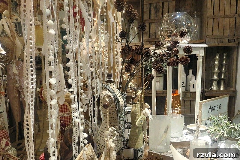 My Town's Best Kept Secrets 17 Elegant display of crocheted ribbons, dress form, and pine cones in a boutique