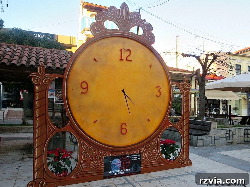 My Town's Best Kept Secrets 3 Majestic clock standing guard in the festive town square during Greek Christmas