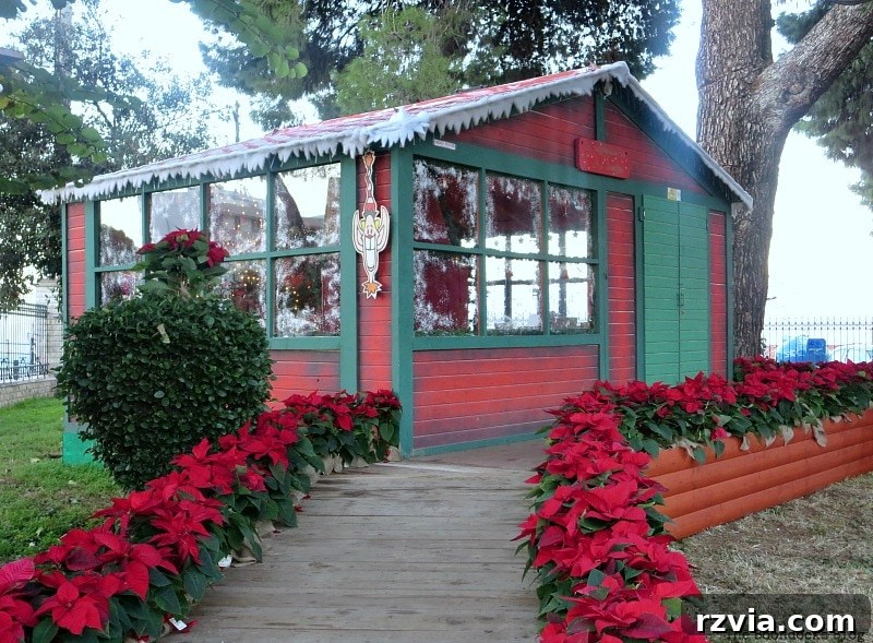 My Town's Best Kept Secrets 7 Santa's workshop adorned with poinsettias at the Christmas Park in Greece