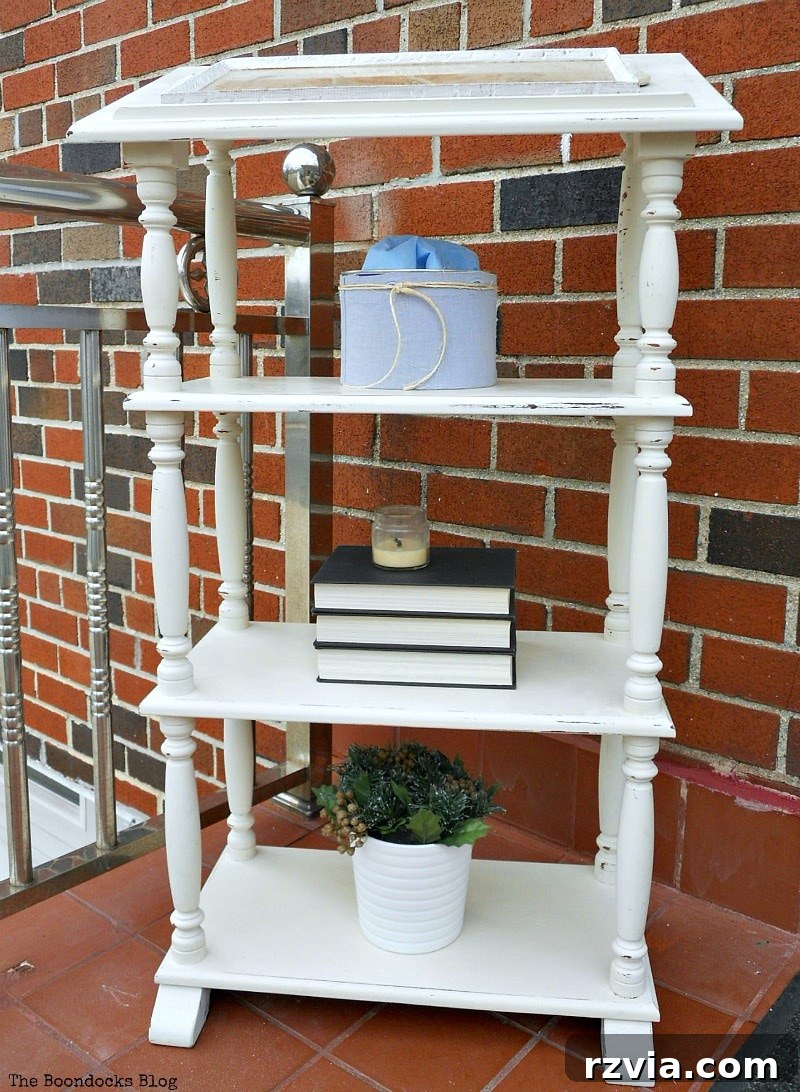 the finished dictionary stand How to Upcycle a Dictionary Stand with Chalk Paint www.theboondocksblog.com