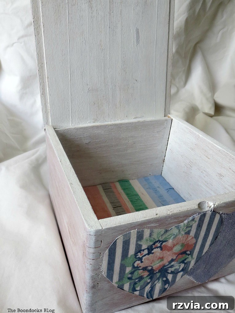 The transformed wooden gift box and heart-shaped bowl filled with chocolates, a triumph over 'glue hell'