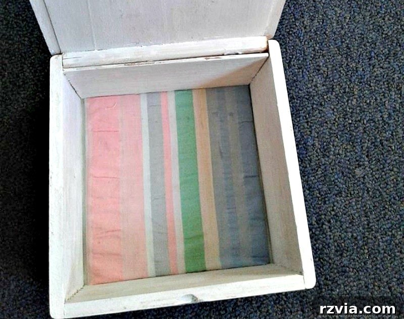 Inside of the wooden gift box with a newly added fabric bottom lining
