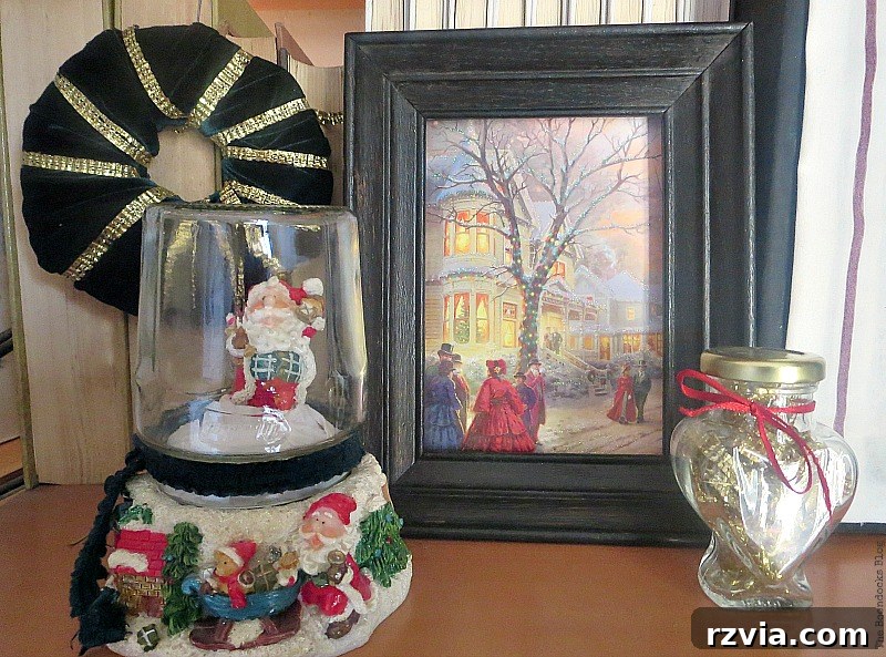 Broken snow globe base repurposed with a jar on top, creating a new Christmas display