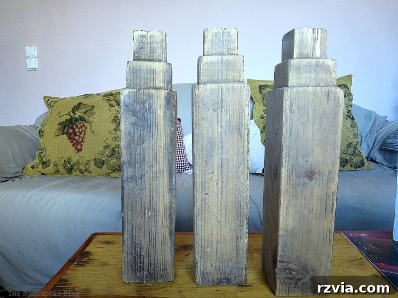 Original discarded wooden legs before their transformation into white decor